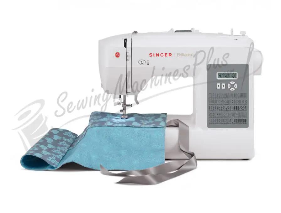 Singer 6199 Brilliance sewing machine, white body with blue fabric and satin ribbon.