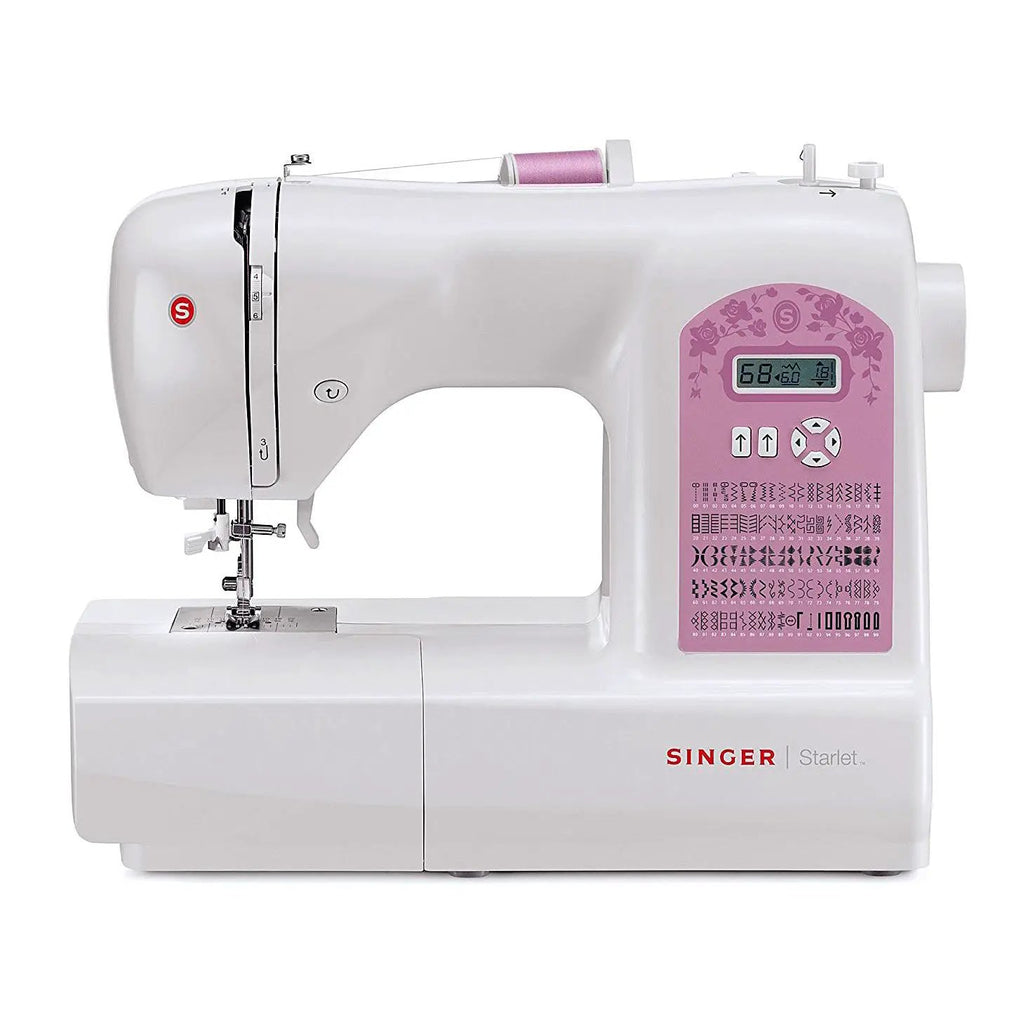 Singer Starlet sewing machine, white with pink floral panel and logo, compact portable model.