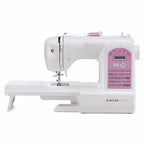 Singer Starlet sewing machine, white with pink control panel and stitch chart.