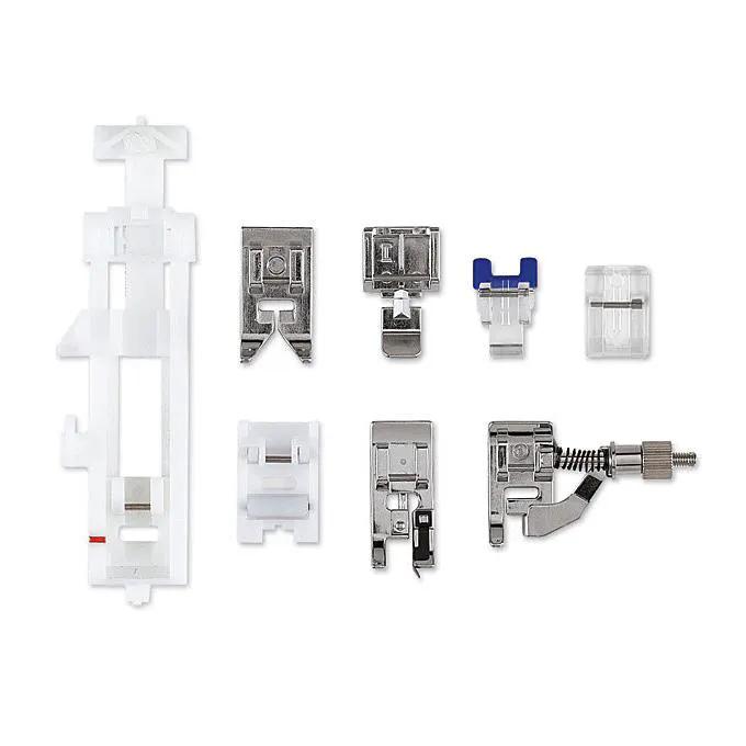 Singer Starlet sewing machine presser feet set, 9-piece with white plastic organizer.