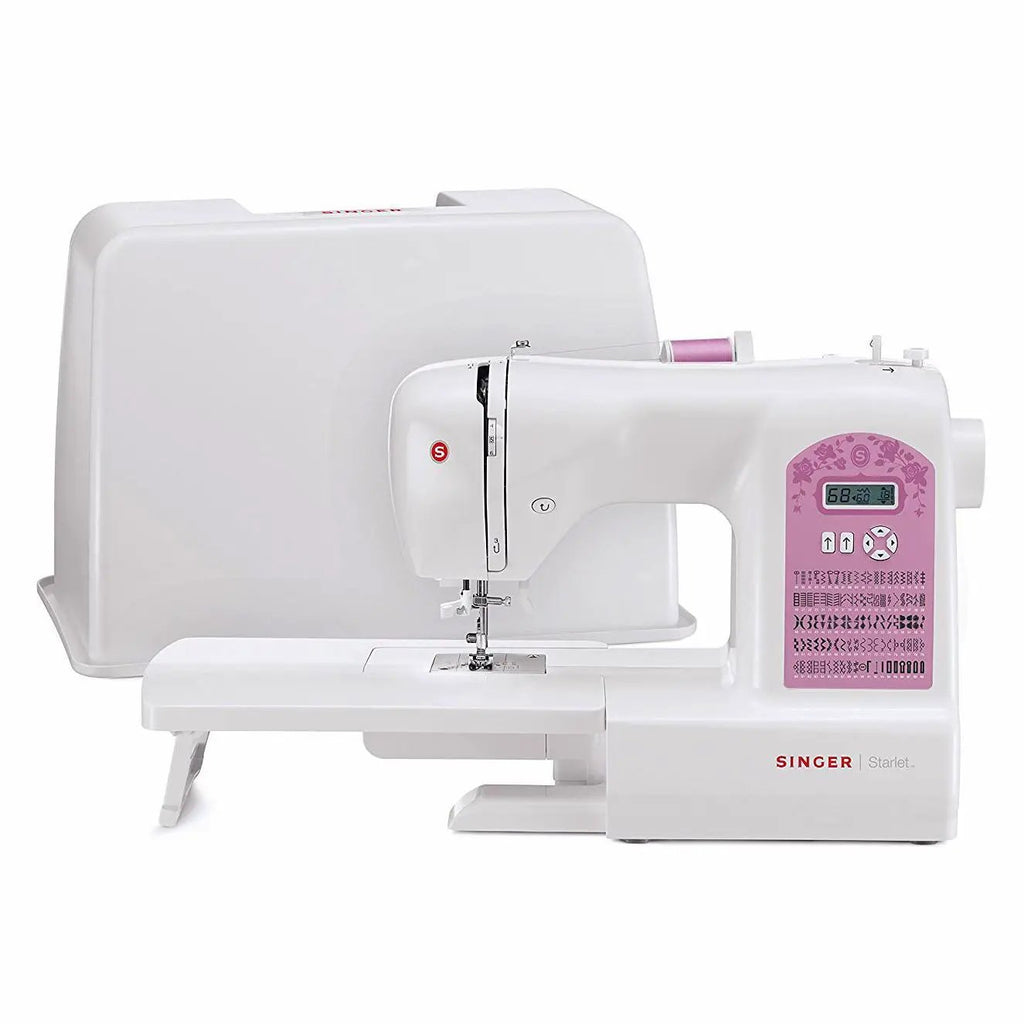 Singer Starlet sewing machine (6699) in white with pink control panel.