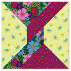 Sizzix Bigz Plus Q Die - Twist fabric cutter die; colorful patchwork quilt fabrics with yellow and floral patterns.