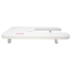 Janome 1600P Series extension table, white, 27in W x 13.5in D with red Janome logo