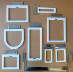 8-in-1 Fast Magne Frame embroidery hoop set by Janome; white plastic hoops with metal mounts for MB-4S