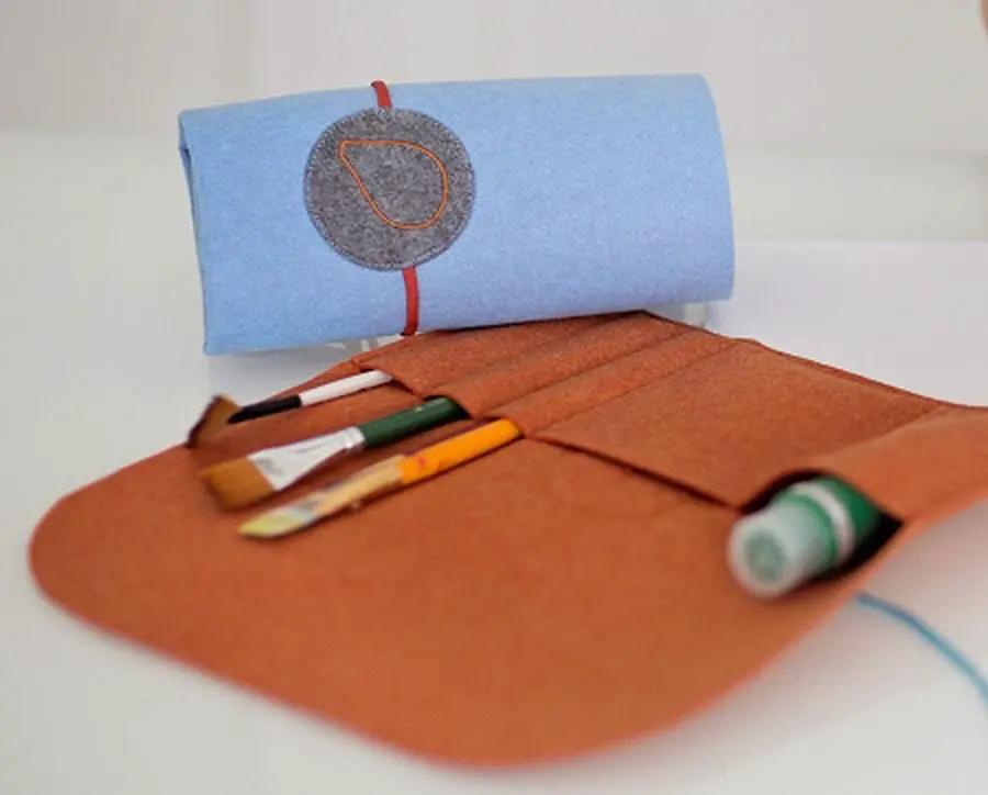 Bluefig Learn to Sew Kit fabric set with orange wrap fabric and blue fabric roll, includes thread and tools
