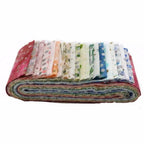 Fabric kit by A Quilter's Dream; Rockin Rail Fence fabrics folded in a rainbow palette.