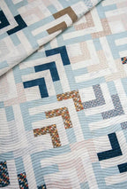 Fabric kit: Lella Boutique Beach Comber quilt fabrics in blues, whites, and tan geometric patches.