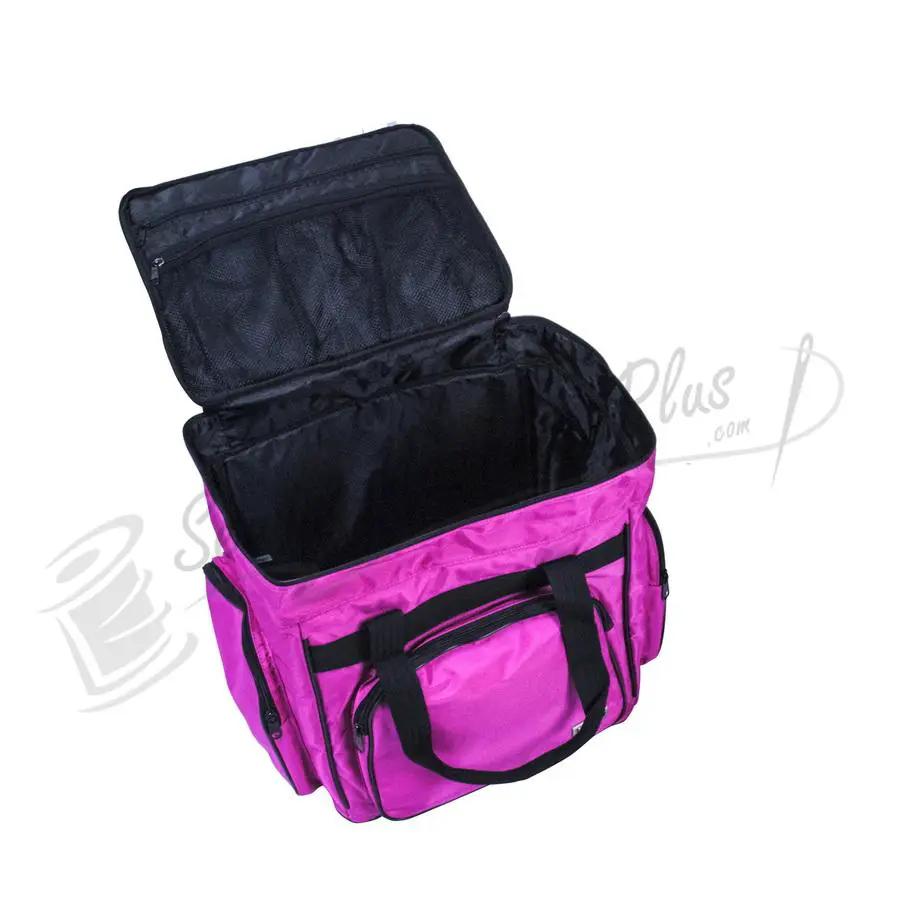 Tutto Serger/Accessory Bag in pink with black handles and zip pockets.