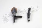 The Bank Vault Canister Vacuum attachments: two black heads, wide brush and narrow crevice tool.