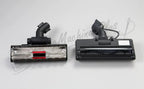 Two The Bank Vault canister vacuum heads, black with chrome front plate and red brush.