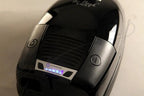 The Bank Vault canister vacuum in black with a silver control panel.