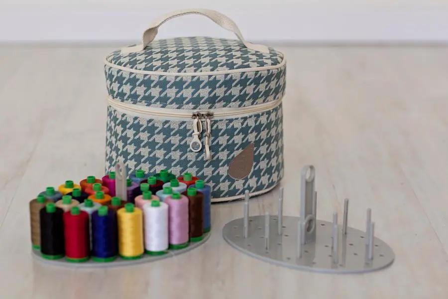 Bluefig Pearl Mini Carry Case, Designer Series, blue houndstooth fabric with zipper and handle, sewing threads and rack.
